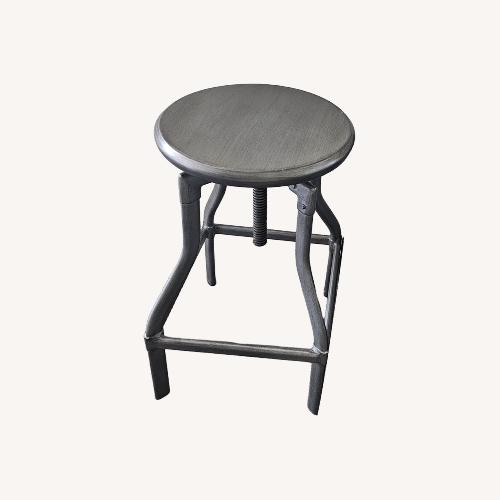 Used Crate & Barrel Silver Adjustable Metal Stools for sale on AptDeco