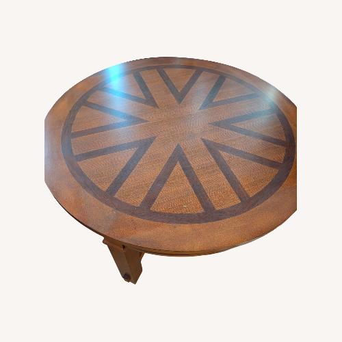 Used Raymour & Flanigan Sunburst Wood Coffee Table for sale on AptDeco