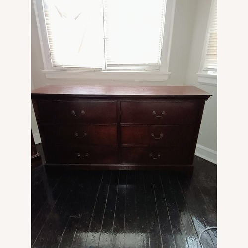 Used Coaster Fine Furniture Dark Brown Wood Dresser for sale on AptDeco