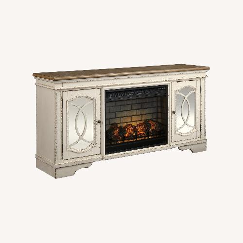 Used Ashley White Wood Media Stand with Electric Fireplace for sale on AptDeco