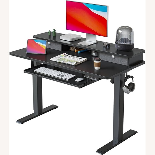 Used FEZIBO Black Standing Desk  for sale on AptDeco