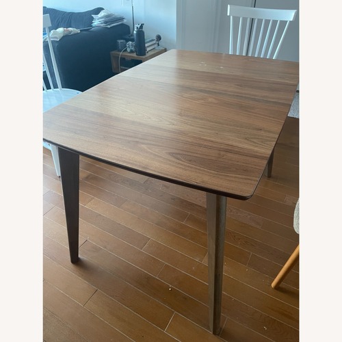Used Meneses 63-inch Extension Leaf Dining Table Natural Walnut for sale on AptDeco