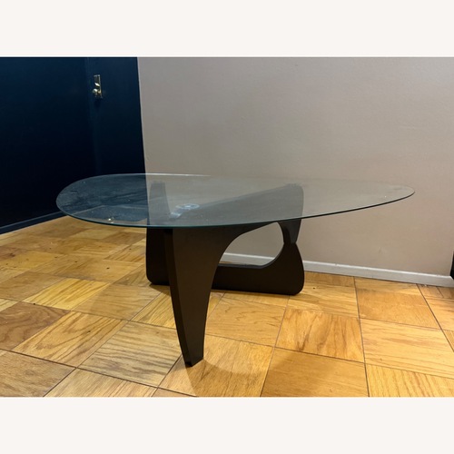 Used Amazon Black Glass Coffee Table for sale on AptDeco