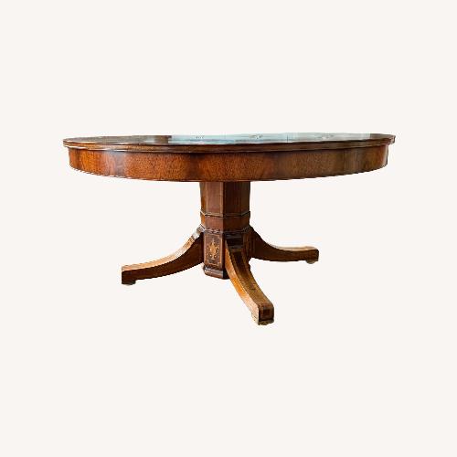 Used Antique Pedestal Round to Oval Dining Table for sale on AptDeco