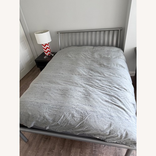 Used Light Gray Metal Queen Bed for sale on AptDeco