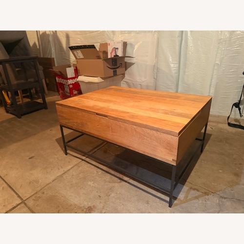 Used West Elm Industrial Storage Pull Up Coffee Table for sale on AptDeco