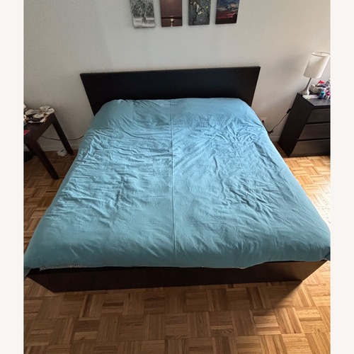 Used IKEA Dark Brown Wood King Bed for sale on AptDeco
