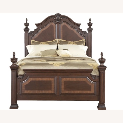 Used Rooms To Go Cortinella Wood King Bed for sale on AptDeco