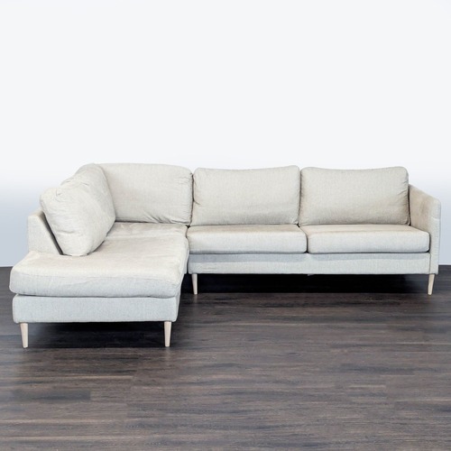 Used BoConcept Cream Sectional Sofa with Chaise for sale on AptDeco