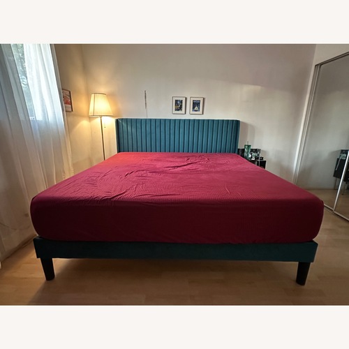 Used Green Wood King Bed for sale on AptDeco