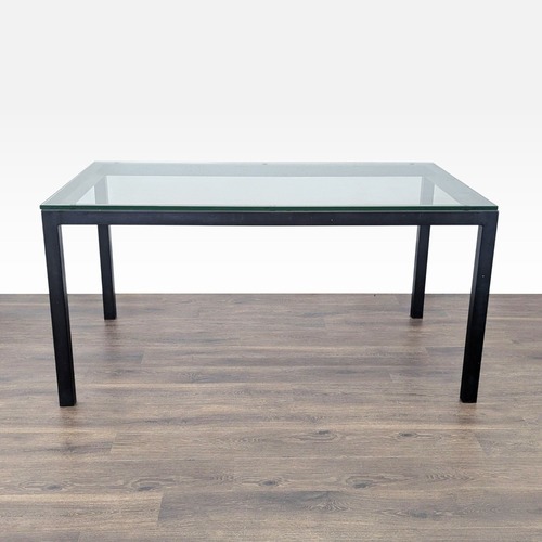Used Crate & Barrel Glass Top Parsons Dining Table for sale on AptDeco