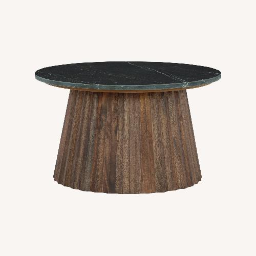 Used Ashley Furniture Ceilby Black Marble Coffee Table for sale on AptDeco