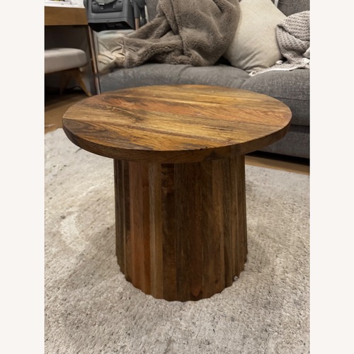Used Ashley Furniture Ceilby Light Brown Wood Side Table for sale on AptDeco