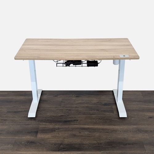 Used Height Adjustable Standing Desk with Light Wood  for sale on AptDeco
