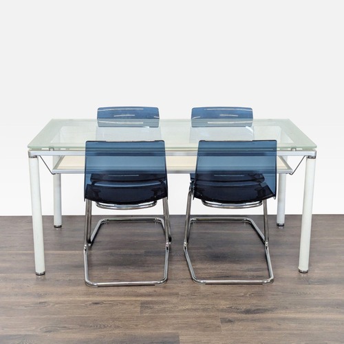 Used Modern Glass Dining Set with 4 Blue Chairs   for sale on AptDeco