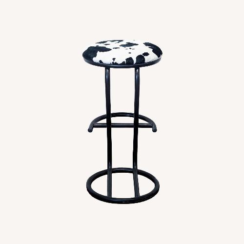 Used Ambiente Faux Cowhide Counter Stool for sale on AptDeco