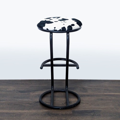 Used Ambiente Faux Cowhide Counter Stool for sale on AptDeco