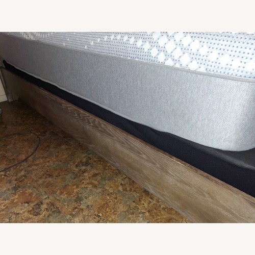 Used Upholstered Queen Bed W Storage for sale on AptDeco