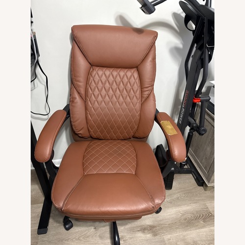 Used Amazon Light Brown Faux Leather Office Chair for sale on AptDeco