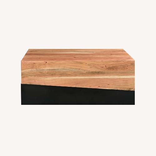 Used Natural Wood/Black Coffee Table for sale on AptDeco
