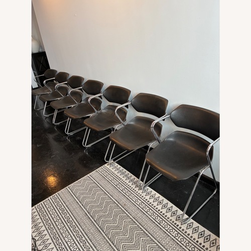 Used Vintage/Antique Black Plastic Armchair for sale on AptDeco