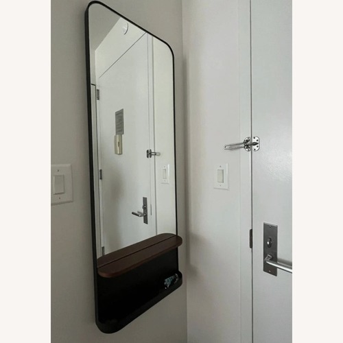 Used West Elm Dark Brown Wood Wall Mirror for sale on AptDeco