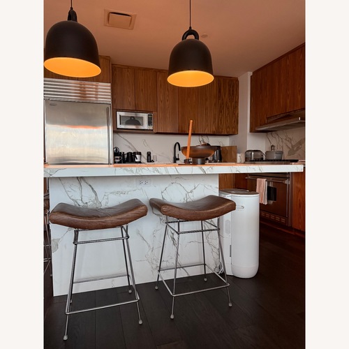 Used Vintage Milo Baughmagn Dark Brown Leather Stool for sale on AptDeco