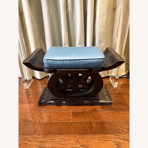 Used Hand-Carved Ottoman / Stool for sale on AptDeco