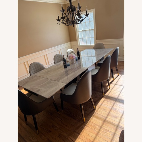 Used Light Gray Sintered Stone Dining Set With 8 Chairs for sale on AptDeco