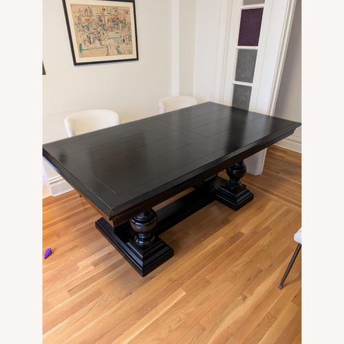 Used Restoration Hardware St. James Black Wood Dining Table for sale on AptDeco