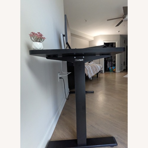 Used Black Standing Desk, Height Adjustable Electric for sale on AptDeco