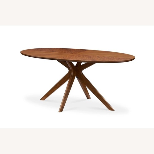 Used Castlery Dark Brown Brighton Oval Dining Table for sale on AptDeco