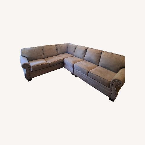 Used Ashley Home Store Grey Sectional for sale on AptDeco