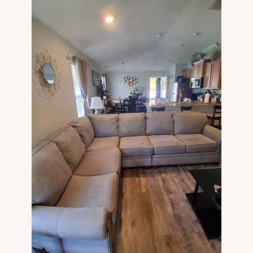 Used Ashley Home Store Grey Sectional for sale on AptDeco
