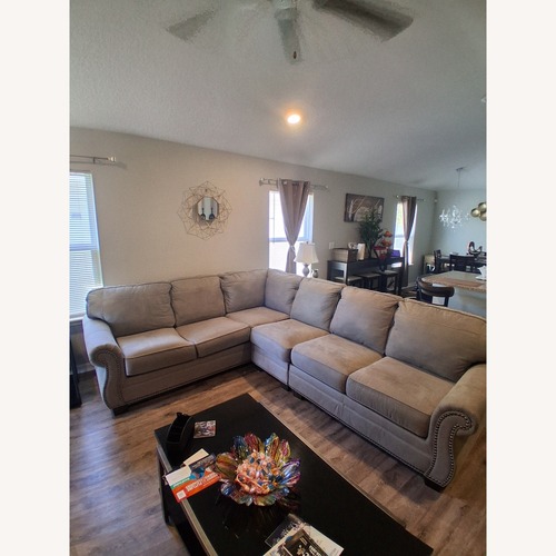 Used Ashley Home Store Grey Sectional for sale on AptDeco