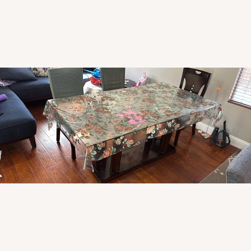 Used Glasstop Dining Table for sale on AptDeco