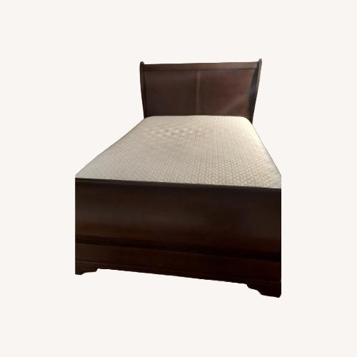 Used Wooden Sleigh Bed with Power Base for sale on AptDeco