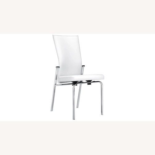 Used Raymour & Flanigan Paloma White Dining Chairs for sale on AptDeco