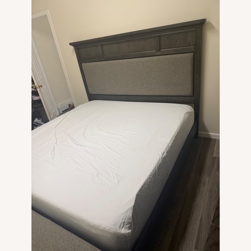 Used Raymour & Flanigan Cambridge King Bed Frame for sale on AptDeco