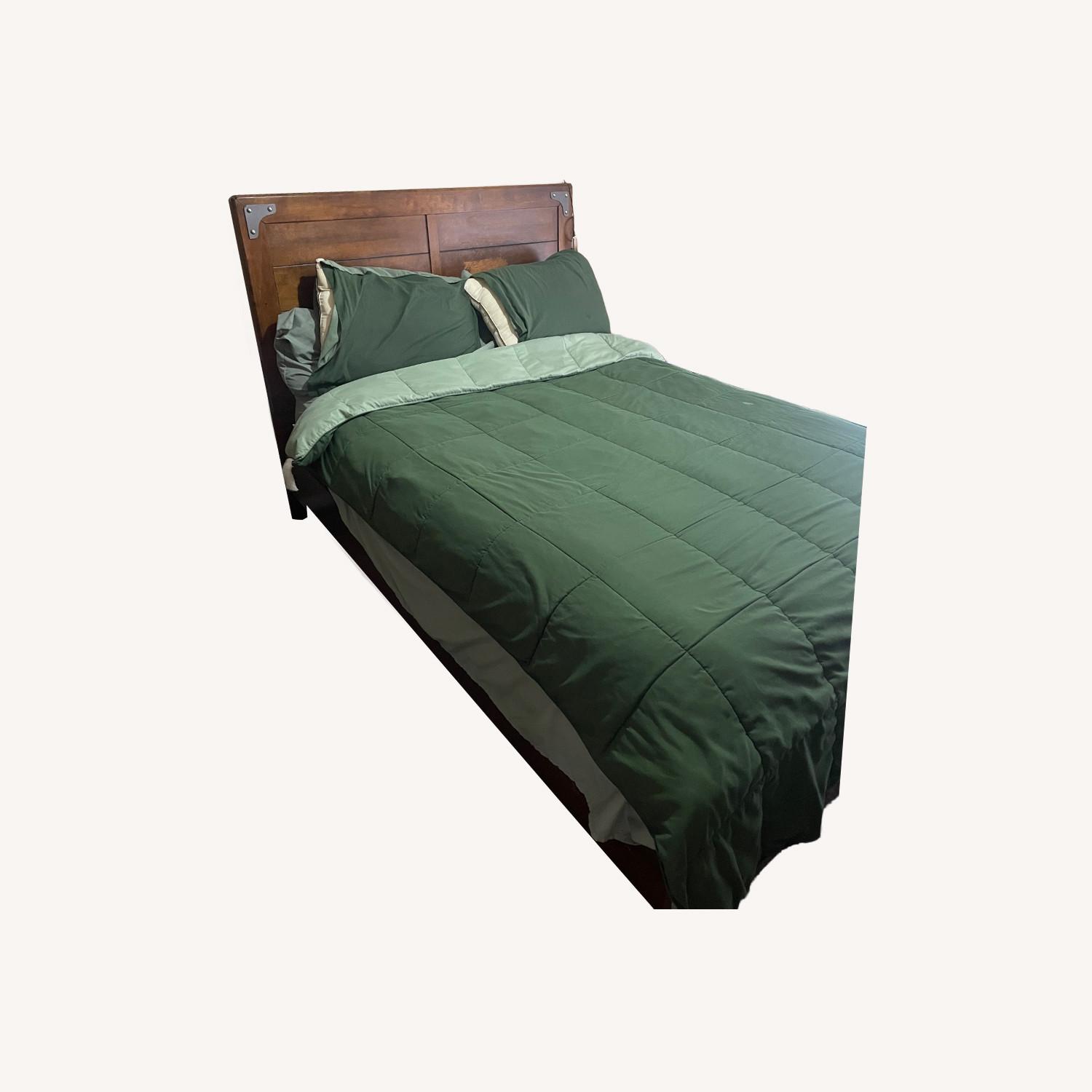 Ashley Furniture Dark Brown Wood Full Bed - image-0