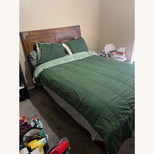 Used Ashley Furniture Dark Brown Wood Full Bed for sale on AptDeco