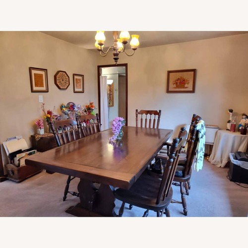 Used Ethan Allen Dark Brown Wood Dining Table for sale on AptDeco