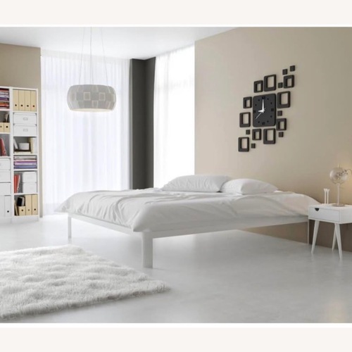 Used White Metal King Bed for sale on AptDeco