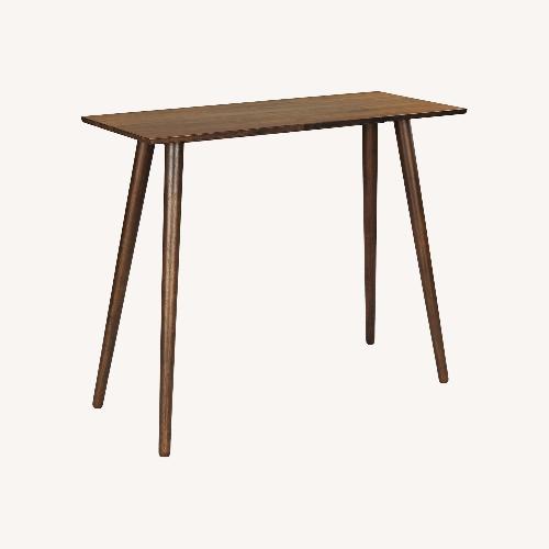 Used Article Seno Dark Brown Wood Dining Table for sale on AptDeco