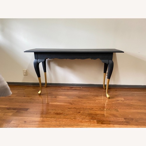 Used  Black and Gold Console Table for sale on AptDeco
