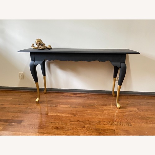 Used  Black and Gold Console Table for sale on AptDeco