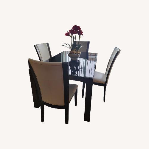 Used Ashley Furniture Dark Brown Glass Dining Sets for sale on AptDeco