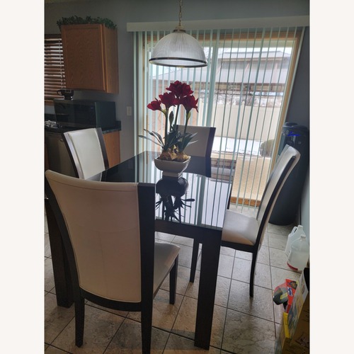 Used Ashley Furniture Dark Brown Glass Dining Sets for sale on AptDeco