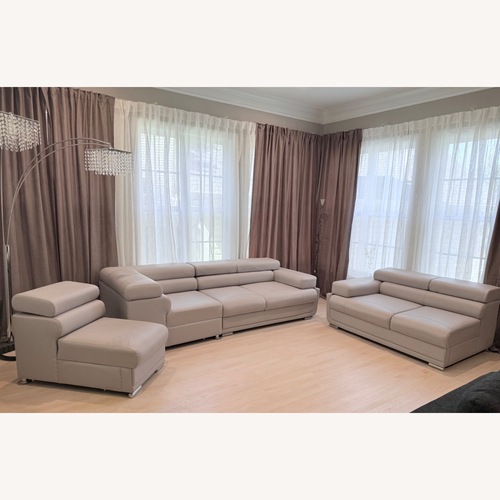 Used Light Gray Leather 3+ Piece Sectional for sale on AptDeco