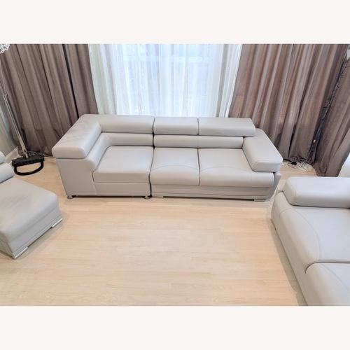Used Light Gray Leather 3+ Piece Sectional for sale on AptDeco